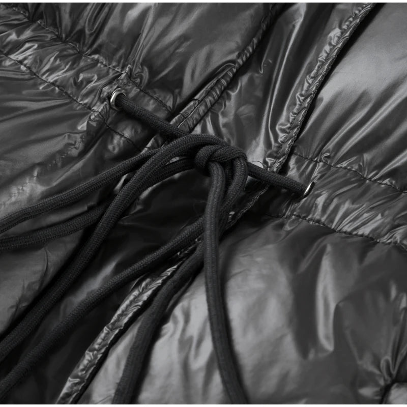 Fashion-Forward Wärme: Schokoladenbraune Pufferjacke mit figurbetonter Taille